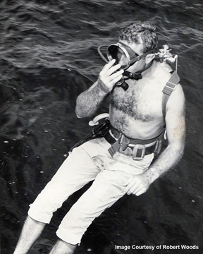 Diver entering the water for first science dive at the Flower Garden Banks in 1960