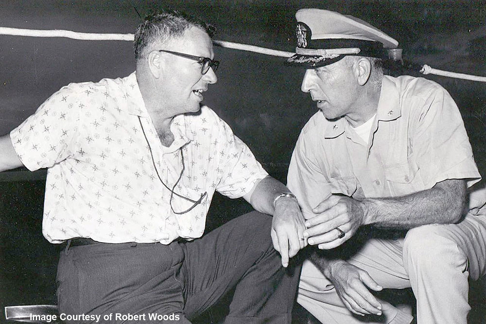Tom Pulley talking to the captain of a Navy ship