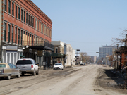 A view of Strand Street in the historic district of Galveston shows mud-strewn streets.