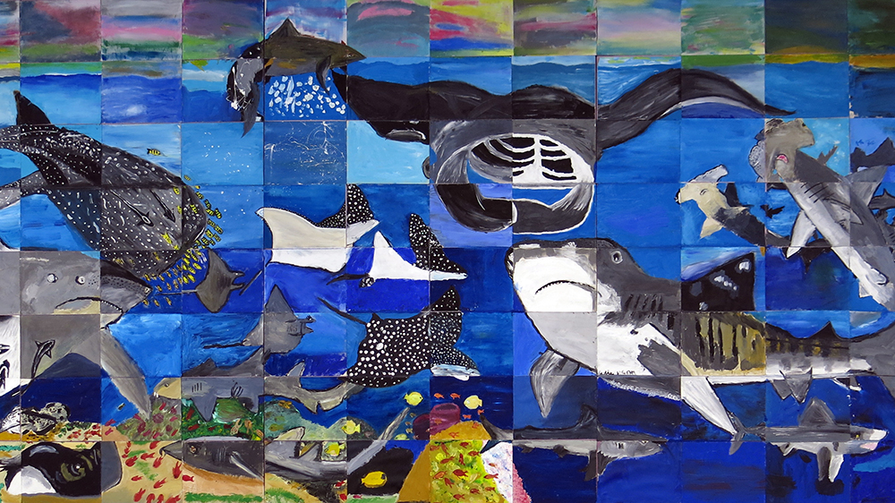 Mosaic mural of sharks and rays painted by Ocean Discovery Day 2017 visitors